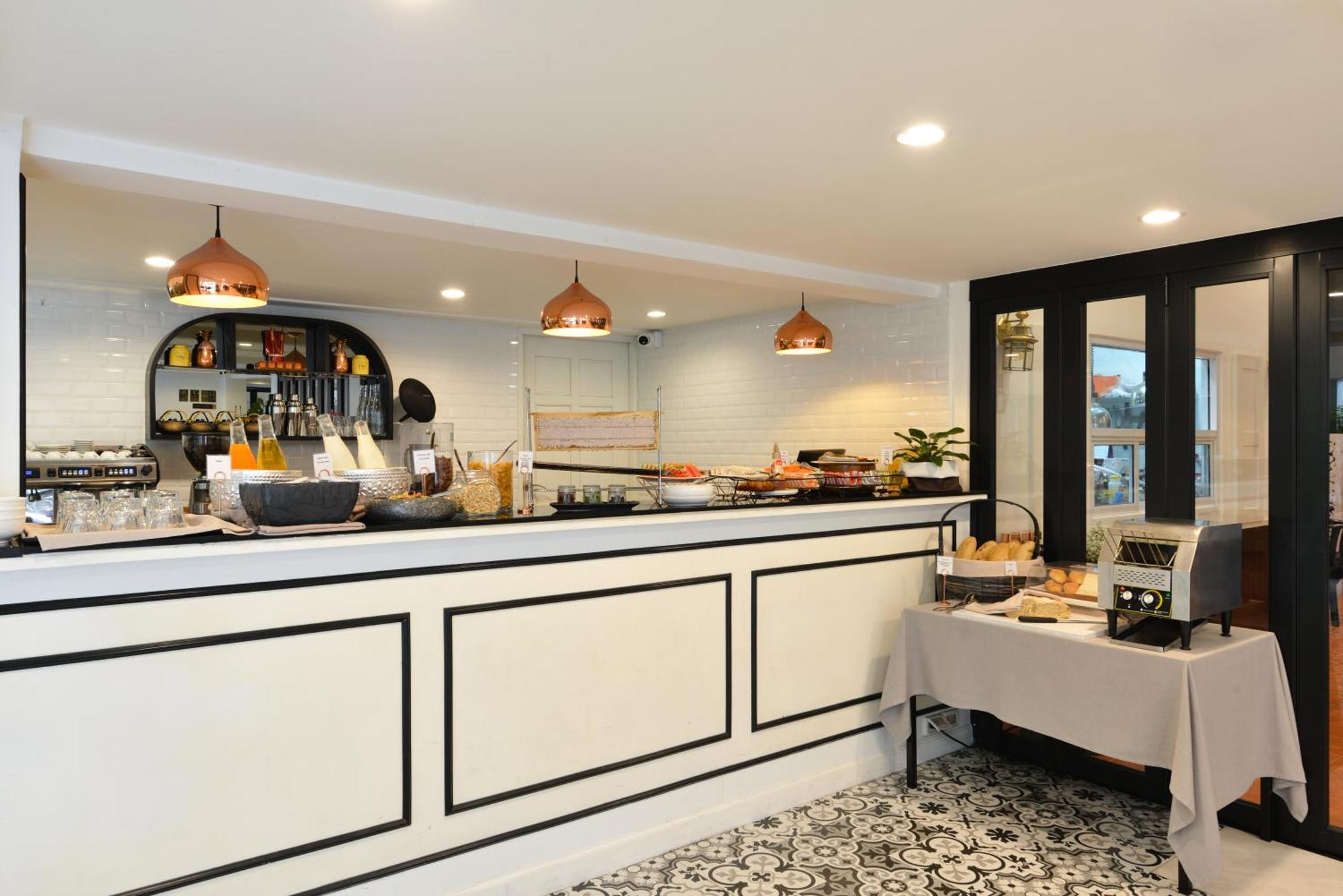 Villa De Pranakorn بانكوك المظهر الخارجي الصورة The bar at the hotel