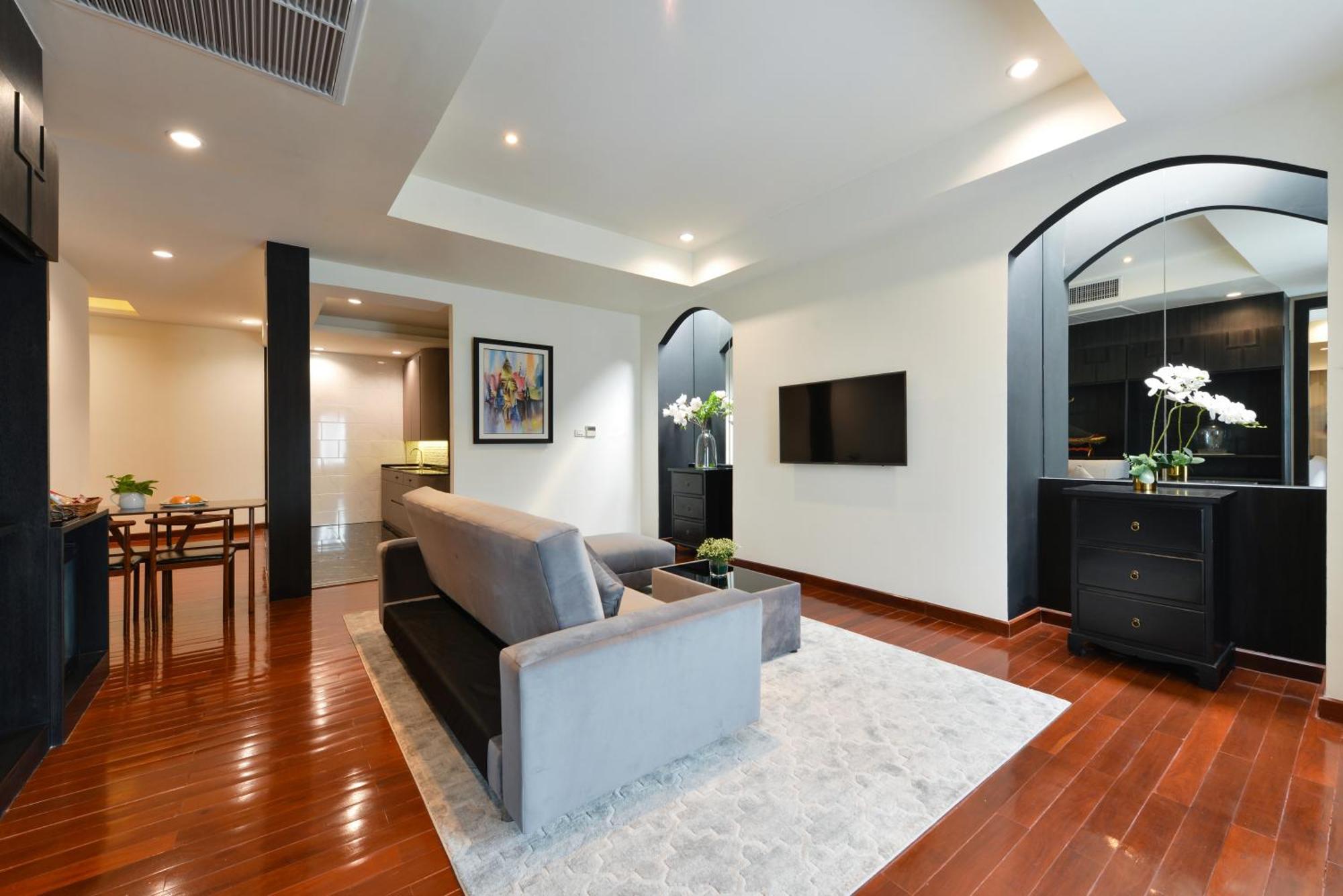 Villa De Pranakorn بانكوك المظهر الخارجي الصورة A living room in a condominium